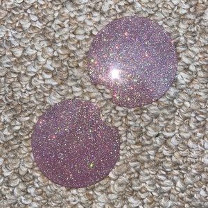 2 pink car coasters